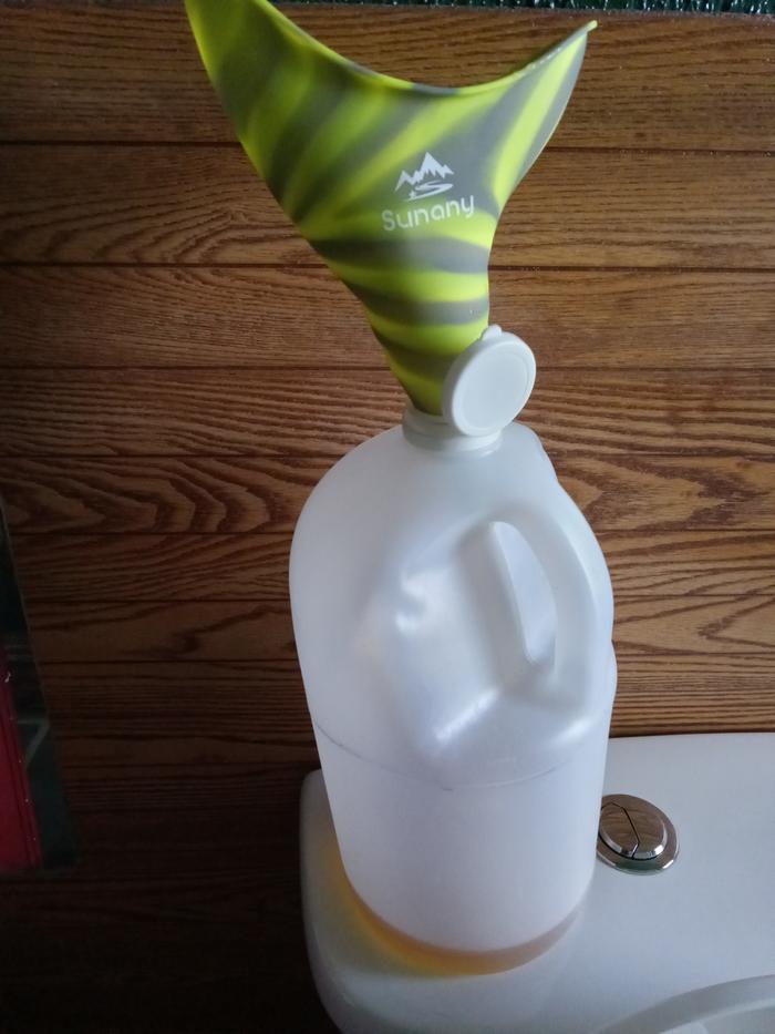 Collection with my wonderful pee without getting it on my foot funnel 