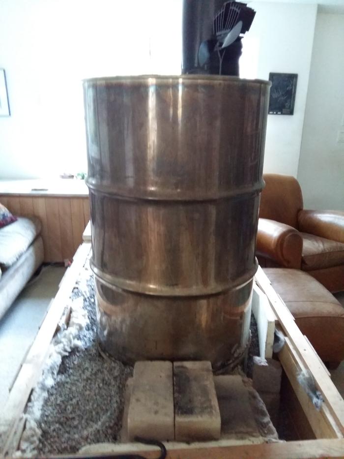 pebble style beautiful stainless steel rocket mass heater